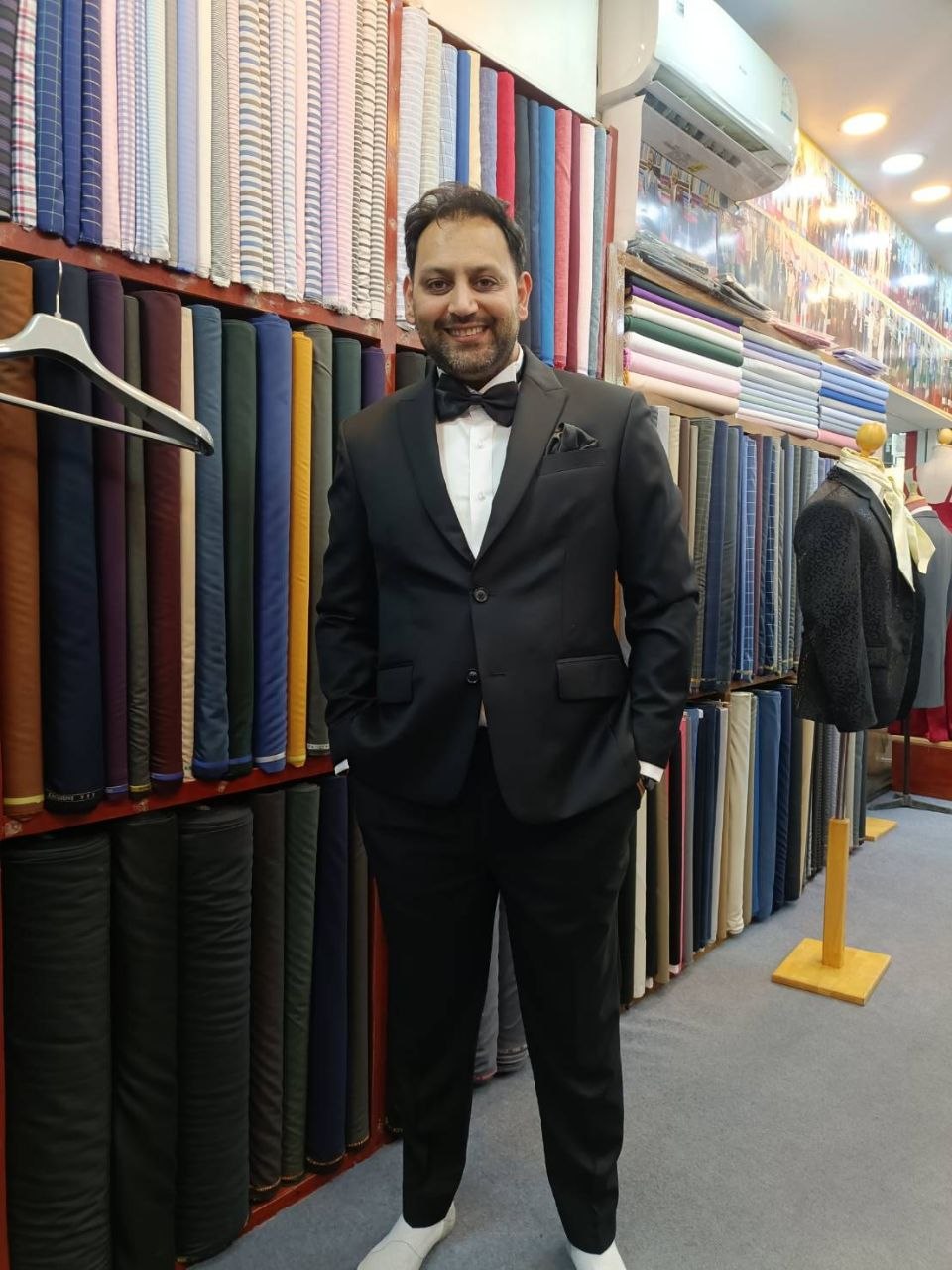 Black formal suit with a bow tie at Smart Fashion